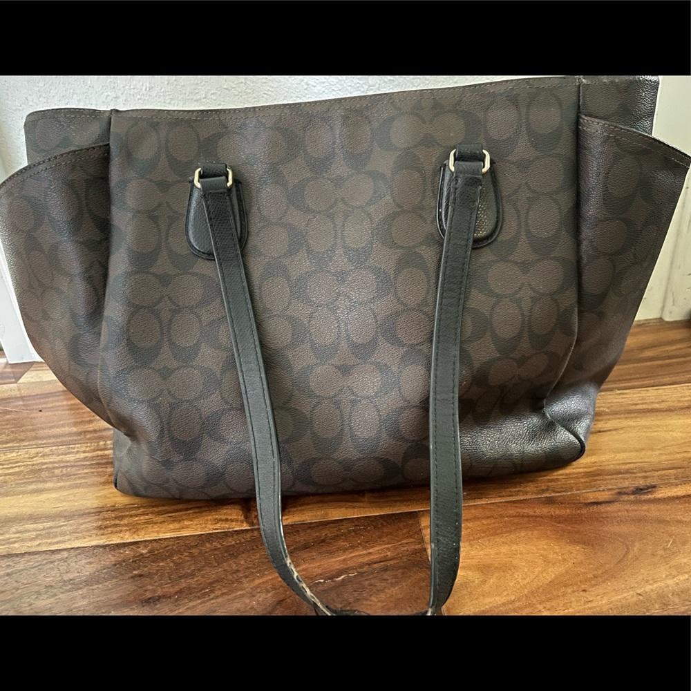 Baby bag coach brand authentic. Gently used. Kept in closet. Kept clean